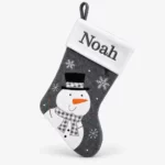 Mörkgrå julstrumpa med snögubbe