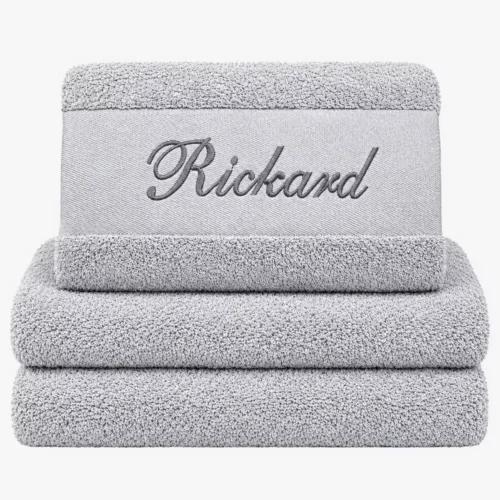 Gray towel with name and black text
