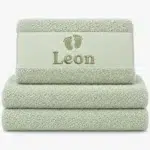 pastel mint colored towel with name embroidered