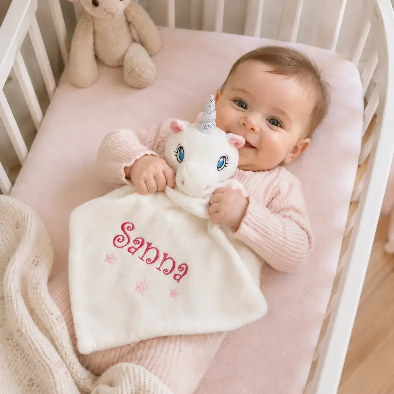 Personlig babyfilt med broderat namn